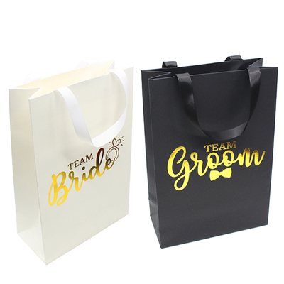 China Black Wedding Jewelry Branded Paper Bags With Grosgrain Handle Gold Foil Logo supplier