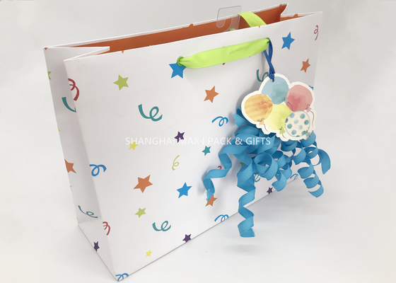 China Party White Christmas Paper Sweet Bags With Handles Ribbon Curved Gift Topper supplier