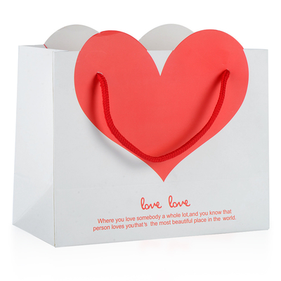 China Heart Shape Retail Paper Shopping Bags / Promotional Gift Bags With Cotton Rope Handle supplier